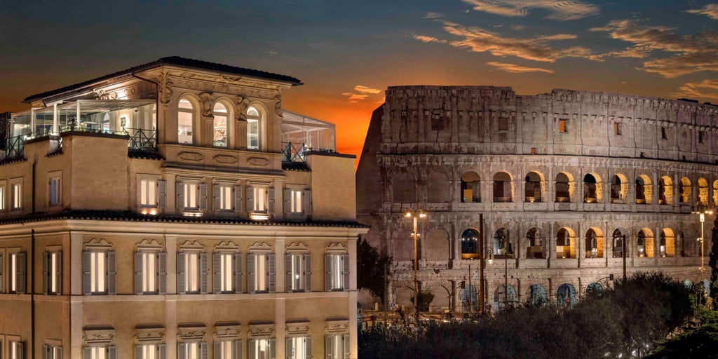 Elegant 5-star Hotel Palazzo Manfredi exterior with classic Italian architecture, featuring ornate balconies and illuminated façade at dusk