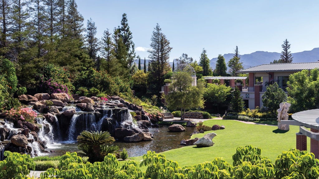 Luxurious Four Seasons Resort with modern architecture, manicured gardens, and elegant exterior nestled in the scenic Westlake Village landscape.