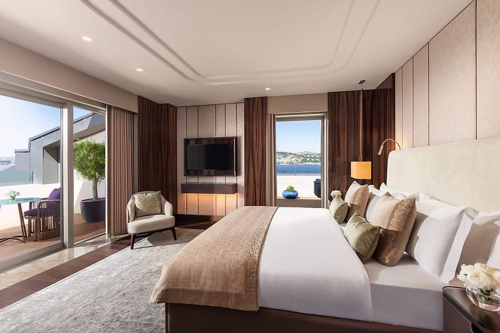 Spacious luxury family room at Mandarin Oriental Bosphorus with elegant king and twin beds, contemporary Turkish design, panoramic city and water views