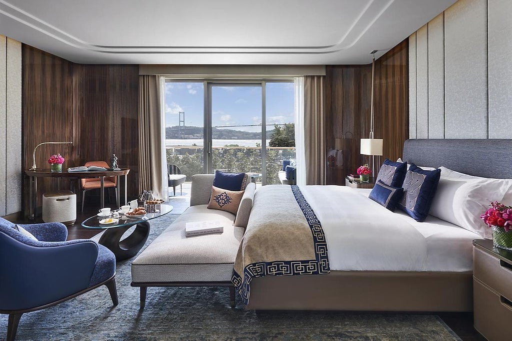 Luxurious Deluxe Bosphorus Room at Mandarin Oriental, featuring elegant decor, panoramic waterfront views, and contemporary Turkish design elements