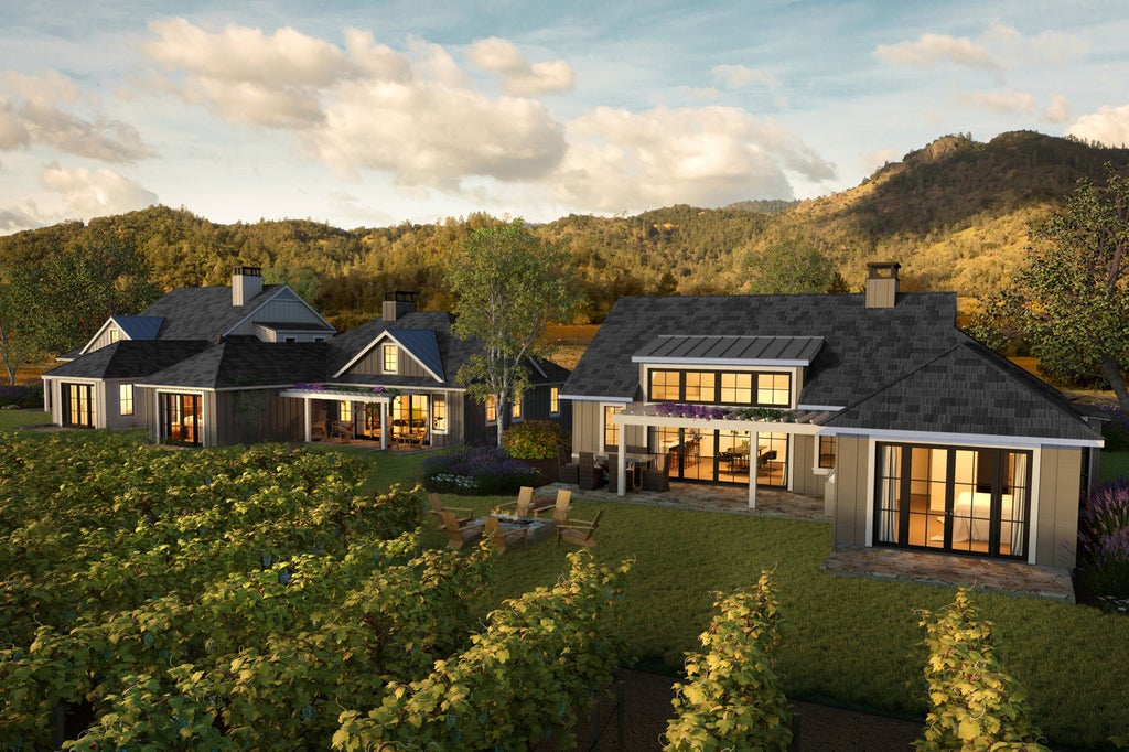 Elegant stone-built luxury resort nestled among rolling vineyards, featuring infinity pool and sweeping mountain views in Napa Valley