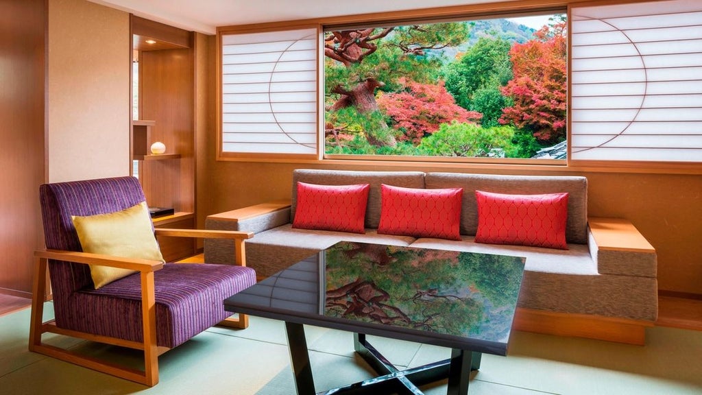 Elegant Suiran Presidential Suite in Kyoto, featuring traditional Japanese design with modern luxury, plush furnishings, and panoramic city or garden vista