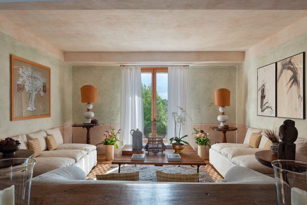 Elegant Tuscan villa suite with rustic stone walls, wooden-beamed ceiling, antique furnishings, and panoramic countryside view through large window