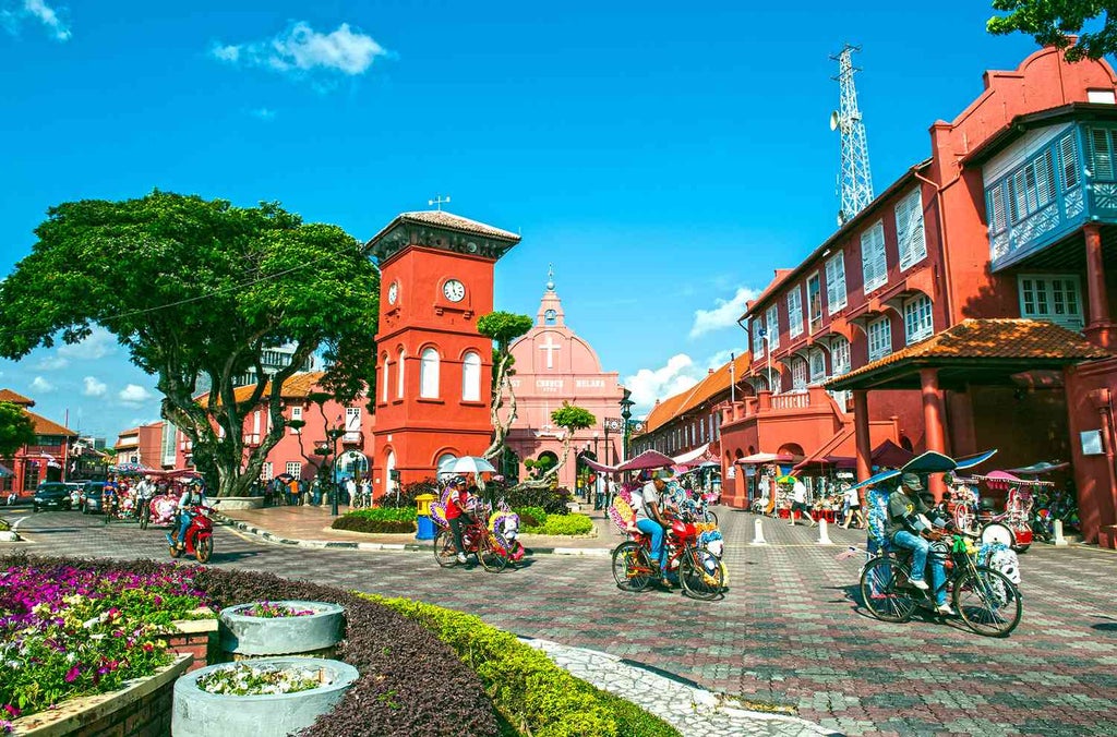 Historic Malacca's vibrant Jonker Street with red lanterns, colonial architecture, and traditional shophouses showcasing Malaysia's rich cultural heritage