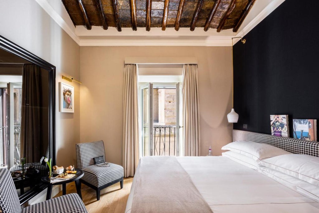 Modern boutique hotel in Rome featuring elegant marble facade, arched windows, wrought iron balconies, and classic Italian architectural details