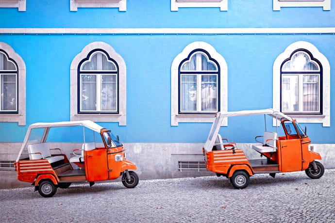 Colorful tuktuks on the streets of Lisbon
