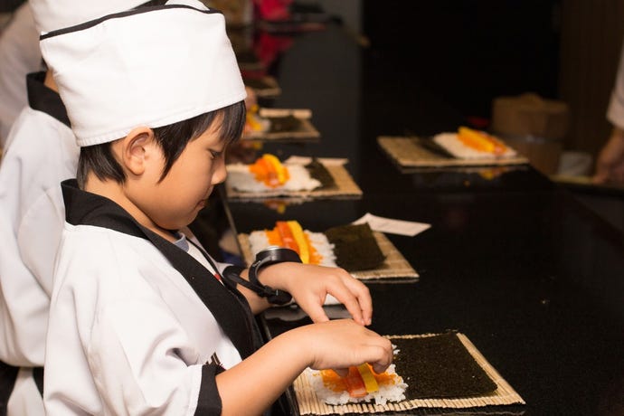 The crucial moment at a sushi making class