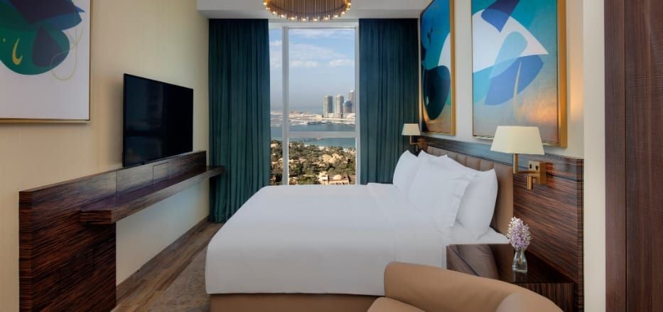 Luxurious two-bedroom sea view apartment at Scenset+ Palm View Dubai Hotel, featuring modern decor, panoramic cityscape, and elegant living spaces