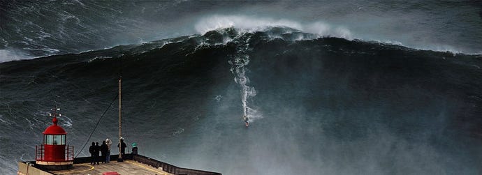 Garret McNamara surfing Nazaré, Portugal – a 30 minute drive up the coastline and well worth the ride