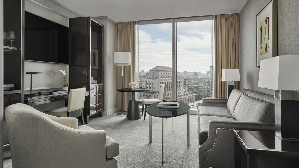 Spacious Four Seasons Executive Accessible Suite in Boston, featuring elegant design, modern amenities, and adaptive luxury accommodations with sophisticated neutral tones