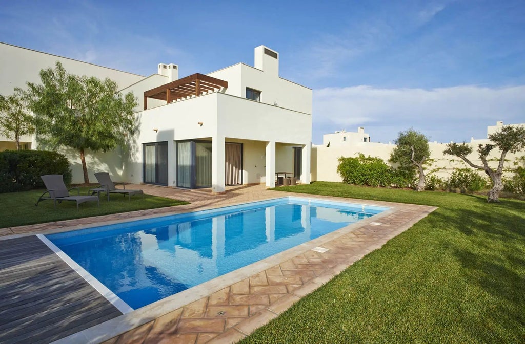 Luxurious Pinewood House at Martinhal Sagres Beach Resort, featuring modern design, wooden interior, and panoramic ocean view in coastal Portugal