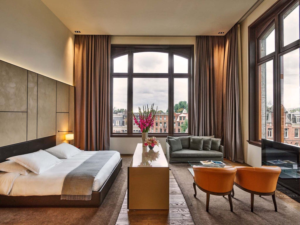 Luxurious Van Baerle Suite at Conservatorium Hotel, Amsterdam, featuring elegant contemporary design with modern furnishings and soft neutral tones