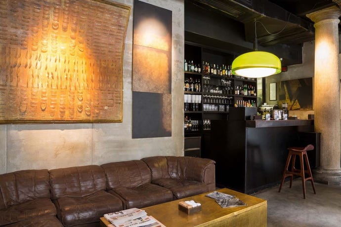 Enjoy a drink at the bar before a night out in Milan
