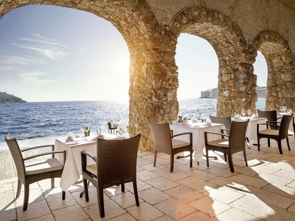 Five-star seaside Hotel Excelsior in Dubrovnik with Mediterranean architecture, private beach, and panoramic views of the Adriatic Sea