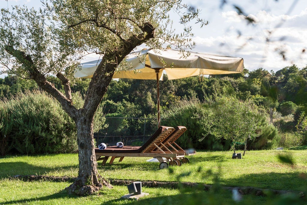 Luxurious two-bedroom pool villa at Monaci delle Terre Nere, featuring elegant Sicilian design with rustic charm and panoramic countryside views