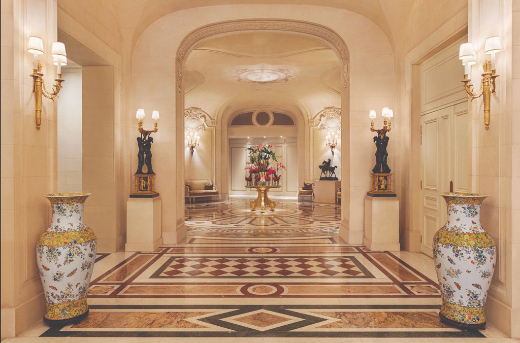 Opulent Shangri-La Hotel in Paris featuring elegant limestone facade, wrought-iron balconies, and manicured gardens with Eiffel Tower views