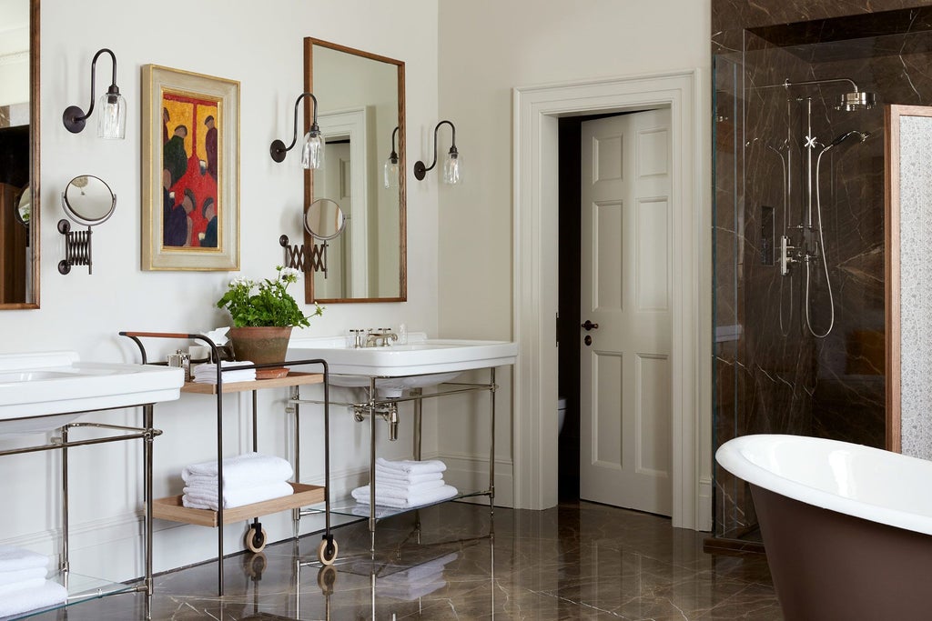 Elegant ochre-toned luxury hotel room at Heckfield Place, featuring soft natural light, refined textiles, and minimalist design in a serene UK countryside setting