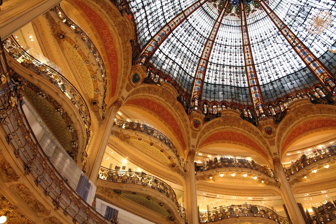 Visit the Galeries Lafayette to see some of the iconic Haussmannian architecture of Paris
