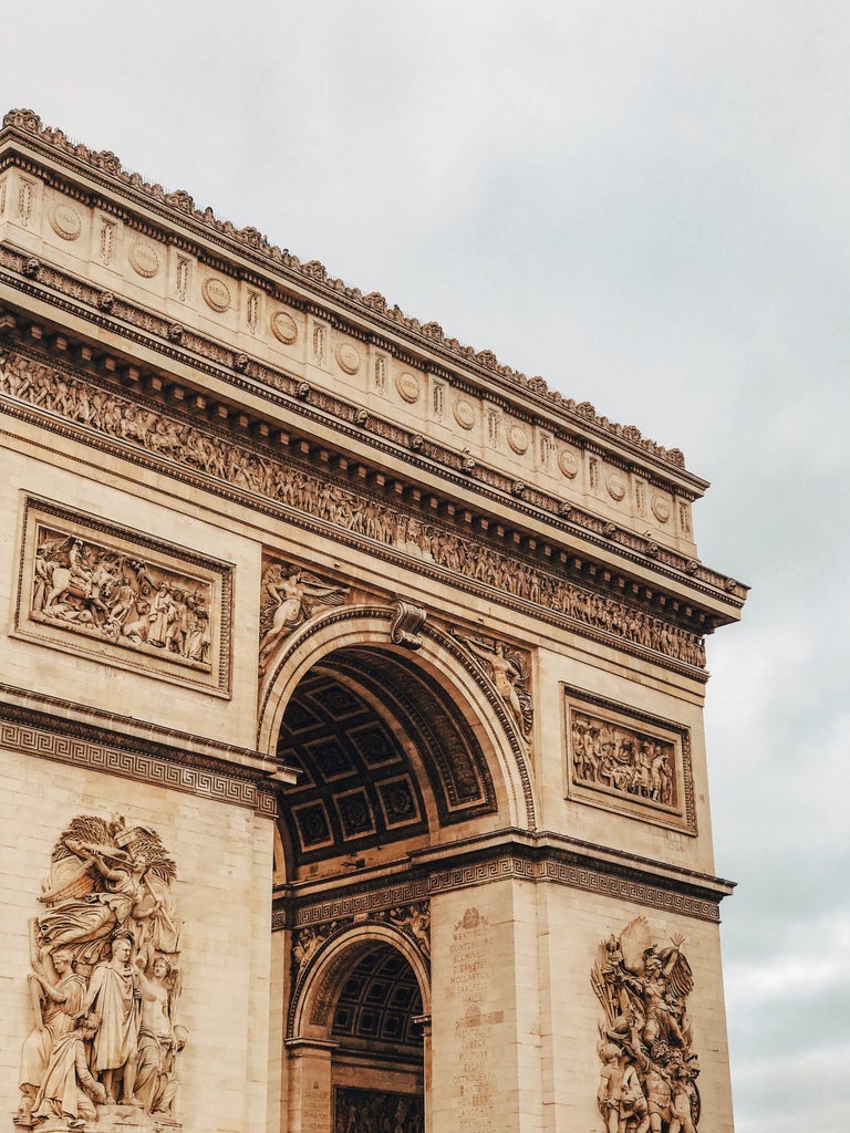 Elegant private tour guide leading guests through Parisian streets, Eiffel Tower gleaming in background, luxurious boutique architecture and chic urban atmosphere capturing Paris's timeless charm