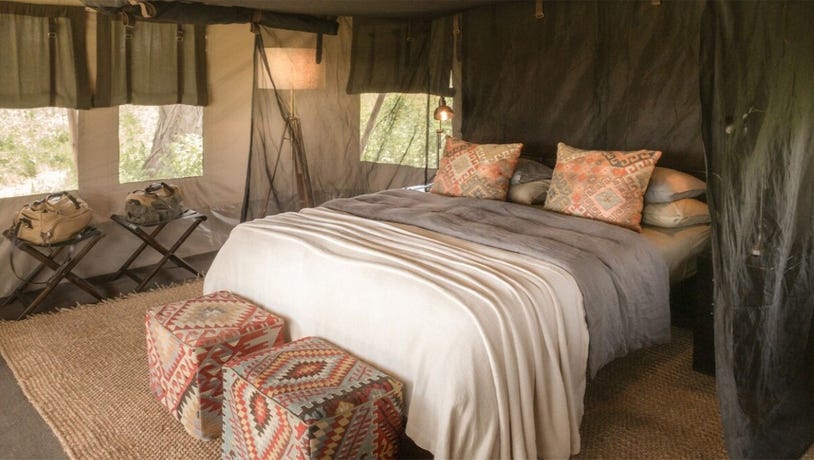 Sleep in the luxurious tented accommodations at a location will be provided.
