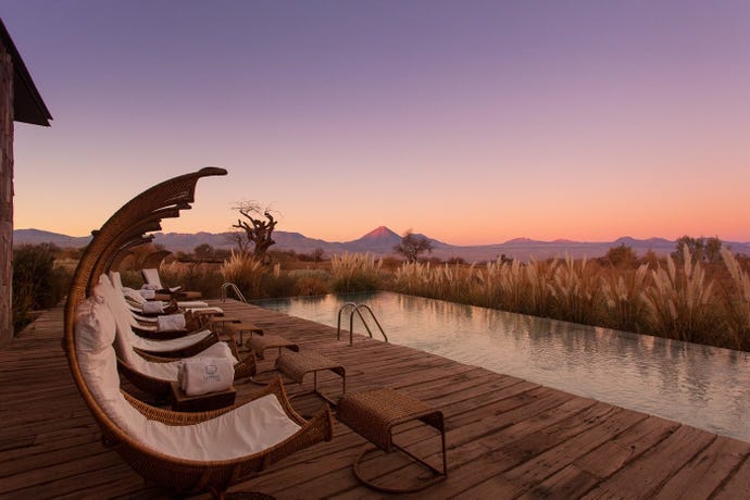 The sun setting over the pool at Tierra Atacama
