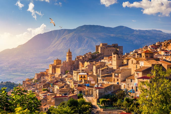 The idyllic beauty of Sicily lies in the stone build villages with Mt.Etna as a backdrop
