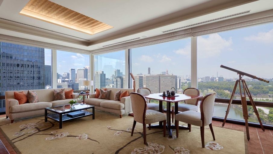 Luxurious interconnected Peninsula Tokyo suite featuring elegant Japanese-inspired decor, panoramic city views, and sophisticated contemporary design elements