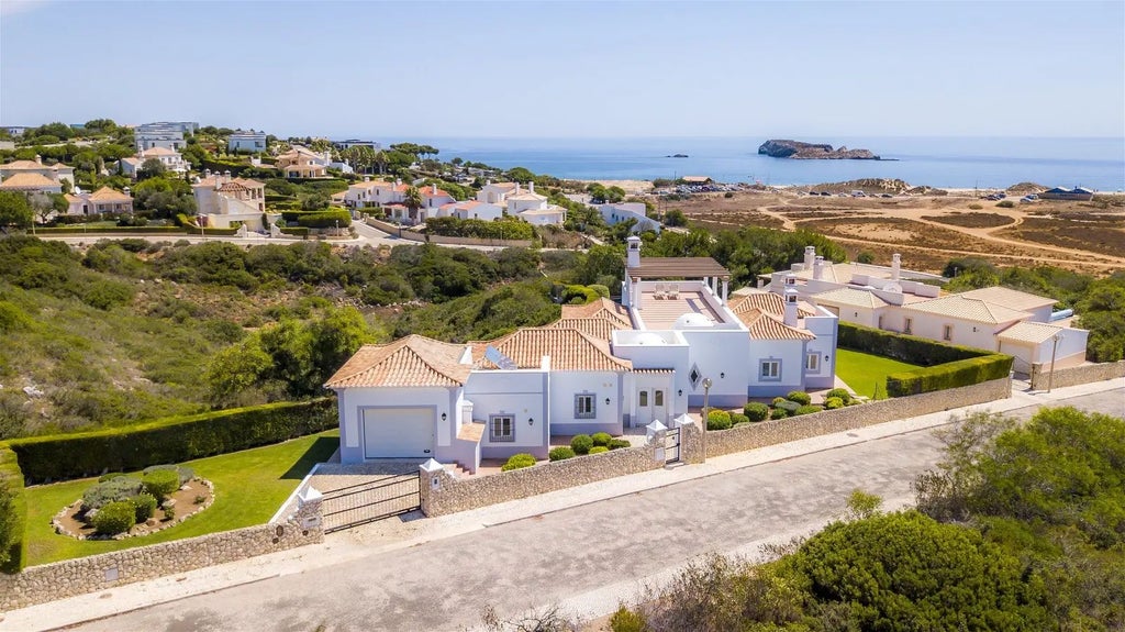 Spacious, modern luxury villa with panoramic ocean views, sleek outdoor terrace, and contemporary design at Martinhal Sagres Beach Family Resort, Portugal