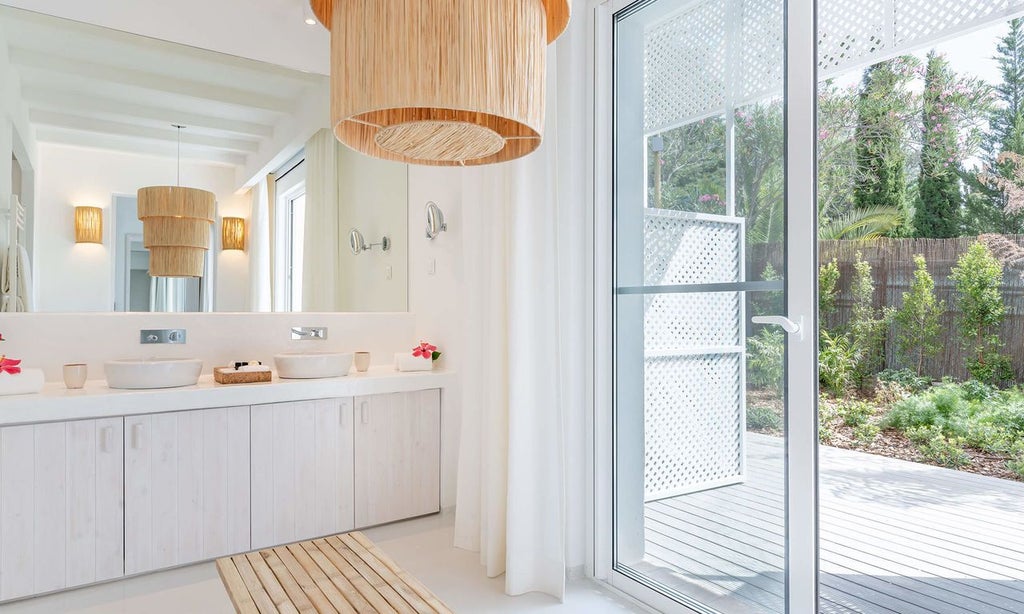 Elegant superior room at Octant Vila Monte with pristine white bedding, minimalist design, warm natural light, and subtle Portuguese coastal aesthetic