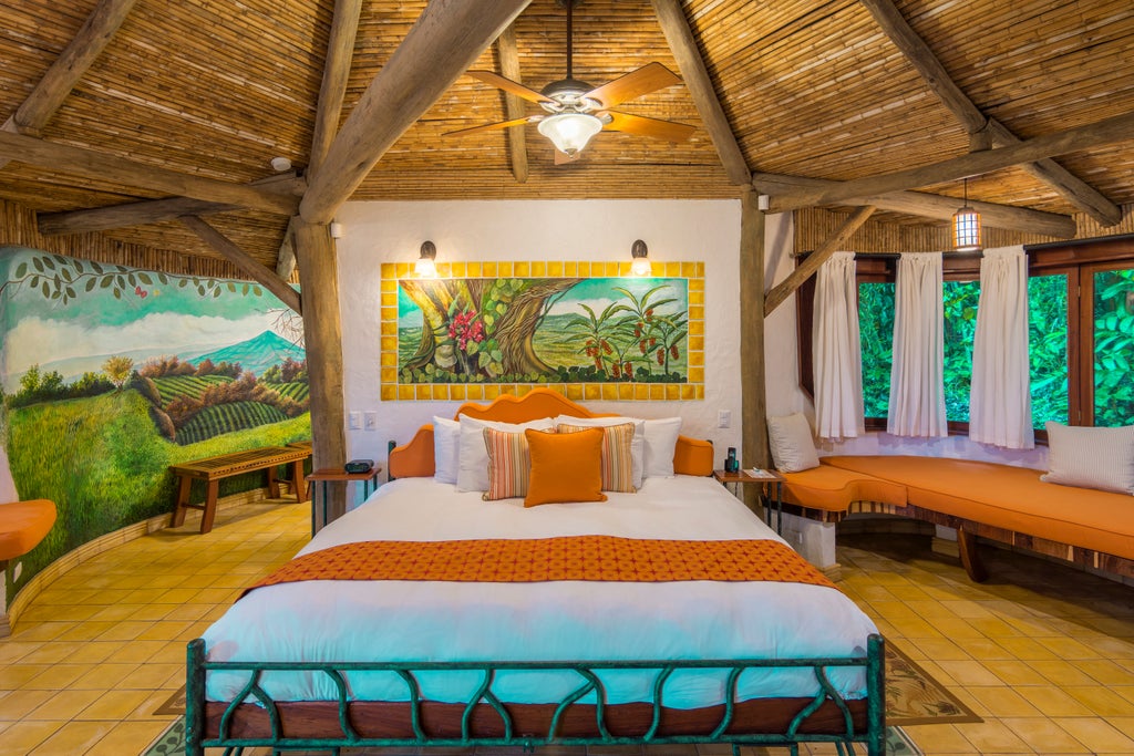 Elegant white-walled luxury inn nestled in Costa Rican coffee plantation with lush tropical gardens and mountain backdrop