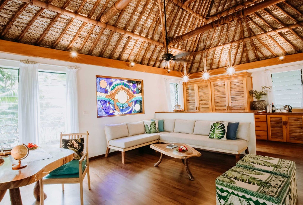 Spacious beachfront villa with private pool, modern furnishings, panoramic ocean views, and elegant Fijian-inspired design at Turtle Island resort