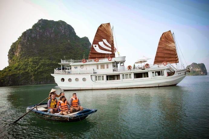 Visit floating villages via sampan boat
