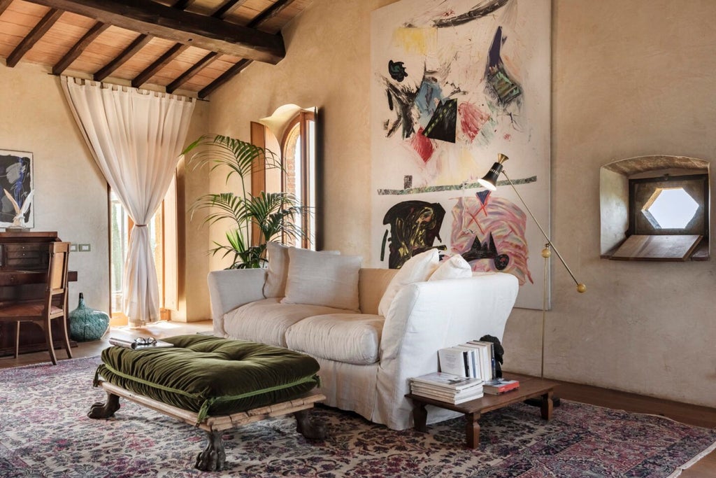 Elegant stone-walled suite with rustic wooden furnishings, arched window overlooking Tuscan countryside, blending historic charm and luxurious design