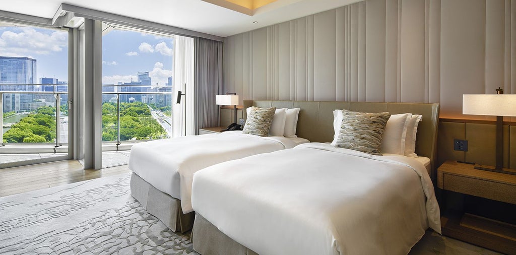 Elegant Premier Suite at a renowned Tokyo luxury hotel with panoramic city views, minimalist Japanese design, and sophisticated neutral color palette