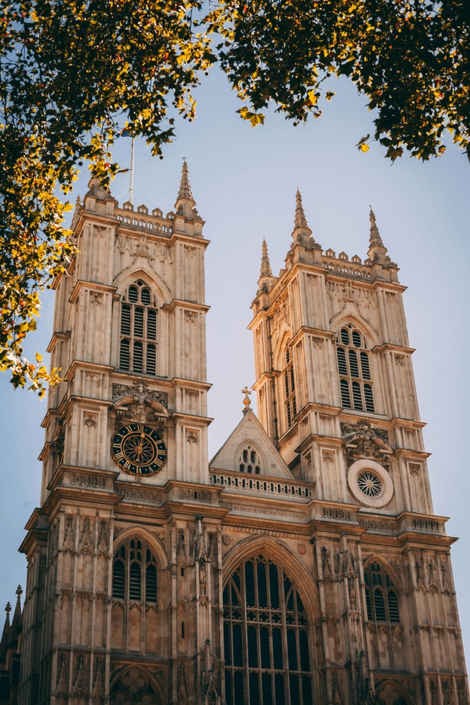 Royal Walk at early morning light, majestic architecture of Westminister Abbey with elegant tourists exploring historic stone pathways in United Kingdom's iconic landmark