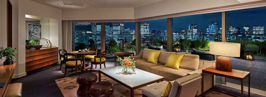 Luxurious terrace suite with panoramic Tokyo skyline view, featuring elegant modern furnishings, floor-to-ceiling windows, and contemporary Japanese design aesthetic