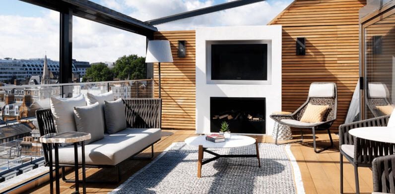 Elegant boutique hotel facade with modern architecture, soft lighting, and sophisticated urban design in central London's prestigious neighborhood