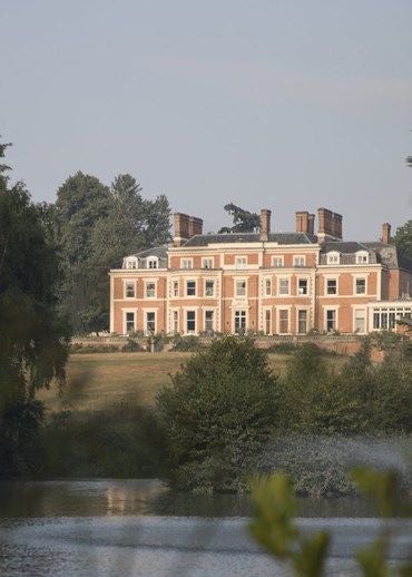 Elegant Georgian manor nestled in lush Hampshire countryside, Scenset hotel radiates refined luxury with manicured gardens and timeless architectural grace