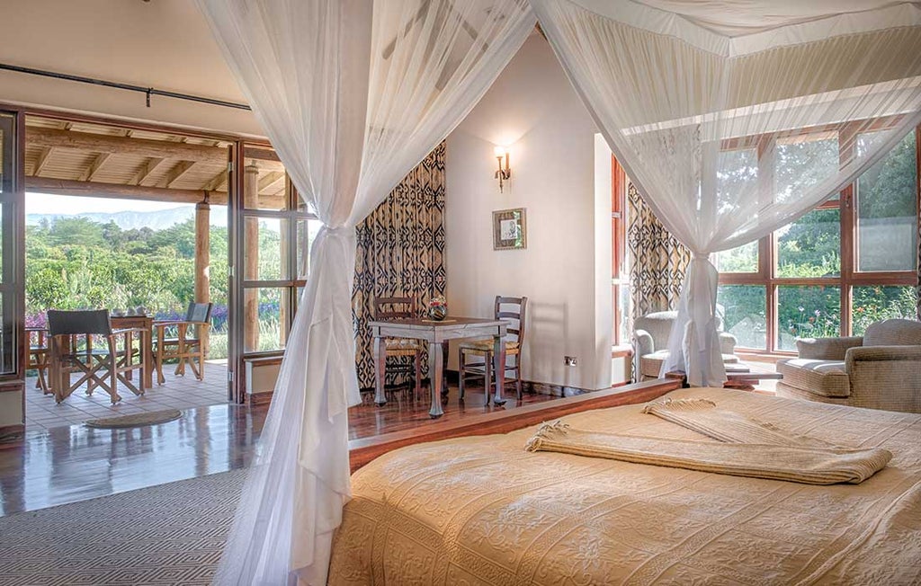 Elegant stone-and-wood luxury lodge nestled among lush gardens at Mount Meru's base, featuring private verandas and colonial-style decor