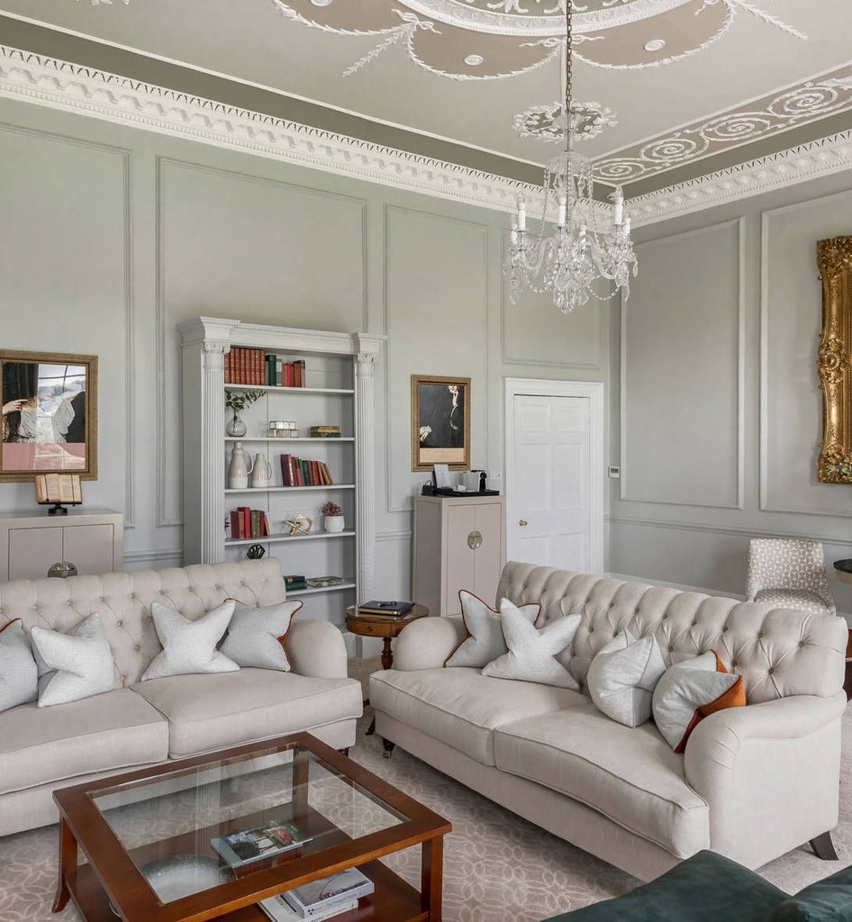 Elegant master suite at the Royal Crescent Hotel & Spa with plush king bed, ornate period furnishings, and soft neutral color palette reflecting British luxury