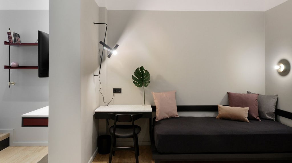 Minimalist XL room with sleek contemporary design, featuring dark wood floors, floor-to-ceiling windows, and plush white bedding overlooking urban scenset skyline