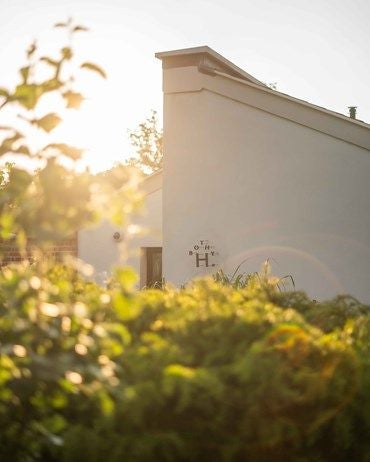 Luxurious Hampshire estate with Georgian architecture, lush gardens, and elegant interiors showcasing natural light and refined countryside elegance