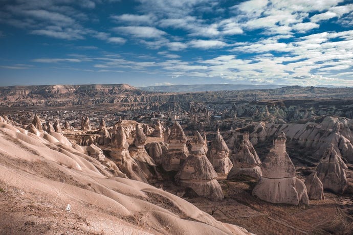 "Fairy chimneys" dot the landscape, formed by 60 million years of erosion of the lava and ash from Mount Erciyes