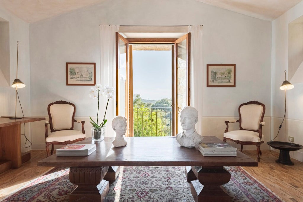 Elegant rustic-chic suite with exposed wooden beams, antique furnishings, and panoramic Tuscan countryside views from large windows at Castello di Vicarello