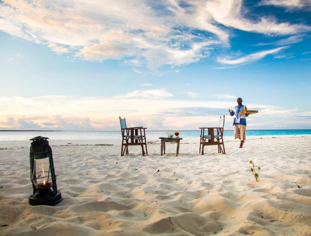 What's a honeymoon without dinner on the beach