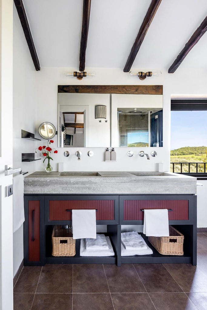 Rustic elegance meets contemporary design in this spacious Tuscan junior suite, featuring warm terracotta tones, exposed wooden beams, and plush white linens