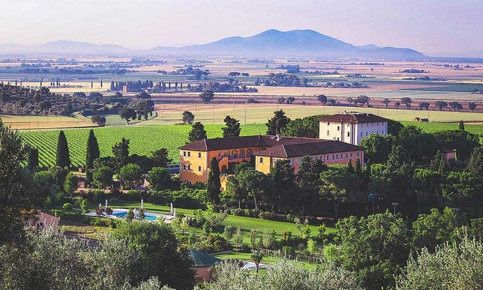 L’Andana is a traditional terracotta villa overlooking vineyards