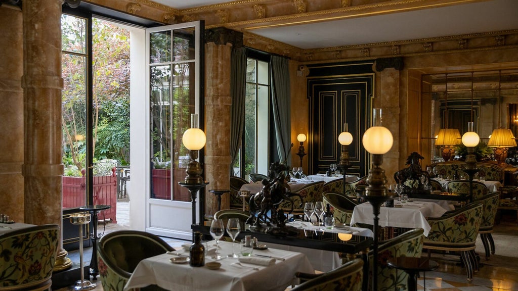 Elegant Parisian luxury hotel exterior with grand neoclassical architecture, plush white facade, and ornate windows overlooking Champs-Élysées at dusk