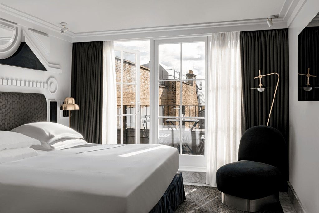 Luxurious superior terrace room with elegant decor, plush white bedding, and a stunning view of the London Eye from a modern hotel in the United Kingdom.