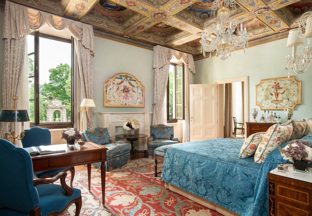 Iconic Renaissance palace turned luxury hotel with manicured Italian gardens, ornate architecture and sweeping terrace views of Florence